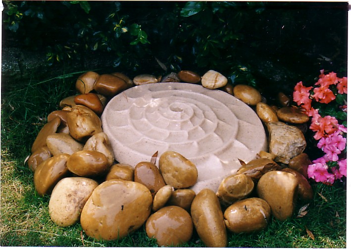 [An Amonite water feature which the frogs love, is in our garden in Remembrance of Angela.JPG]