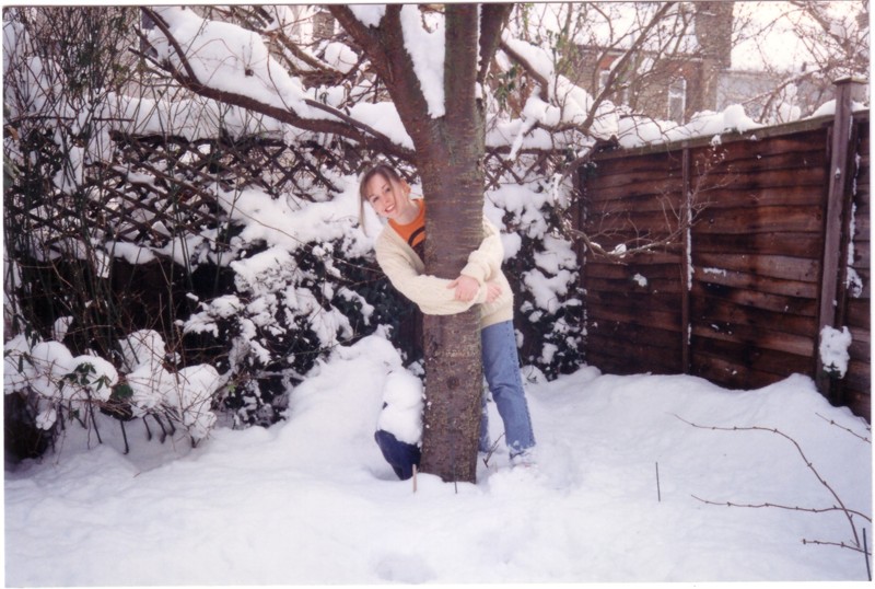 [Angela by her tree in our garden.JPG]